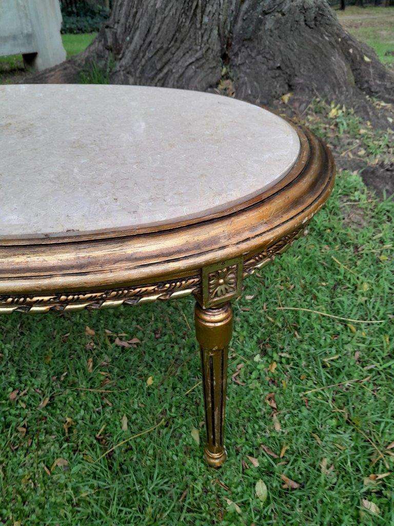 A French Style Oval Carved Giltwood Coffee Table With A Marble Top