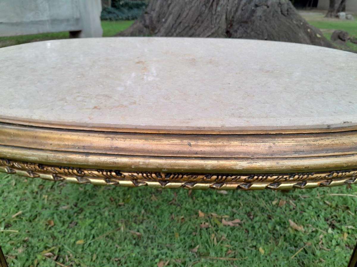 A French Style Oval Carved Giltwood Coffee Table With A Marble Top