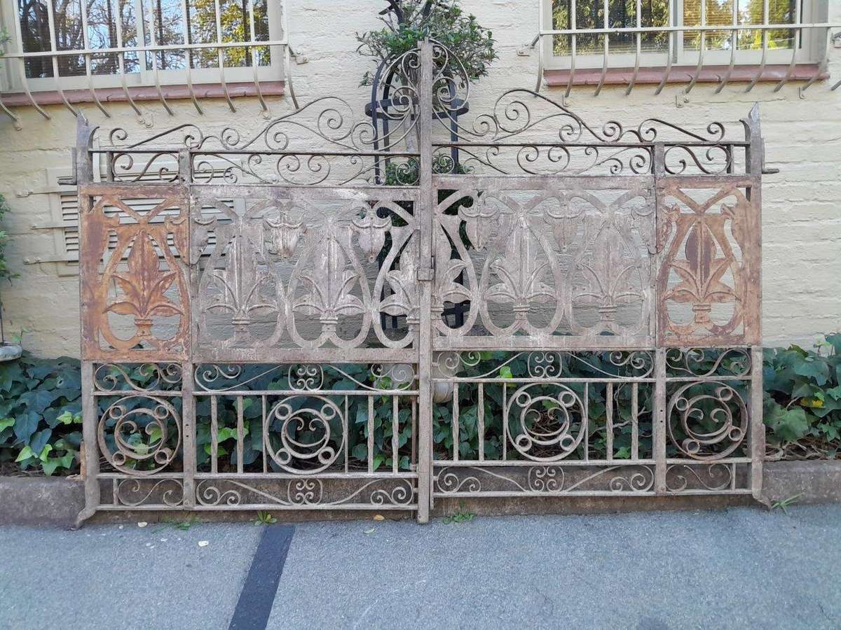 A 20TH Century Pair Of Heavy Hand-Made Wrought Iron Gates