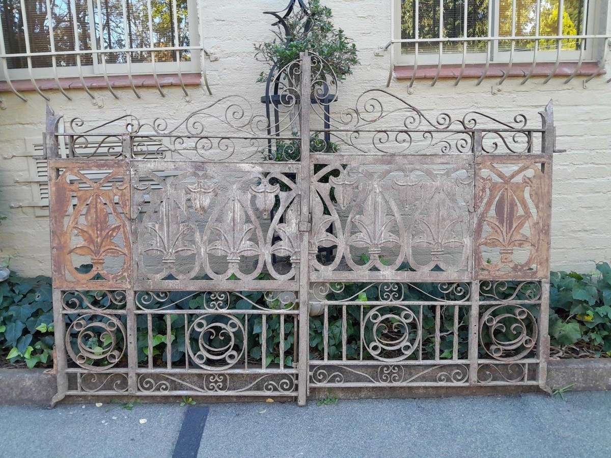 A 20TH Century Pair Of Heavy Hand-Made Wrought Iron Gates