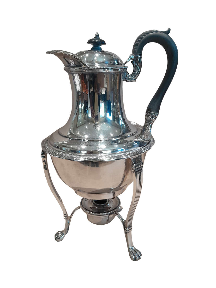 Silver plated tea kettle on stand
