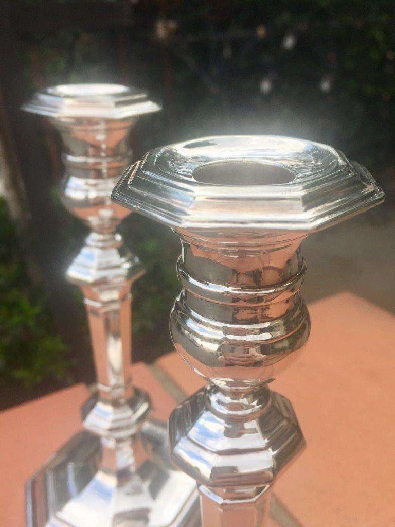 Pair of Mappin & Webb plated candlesticks