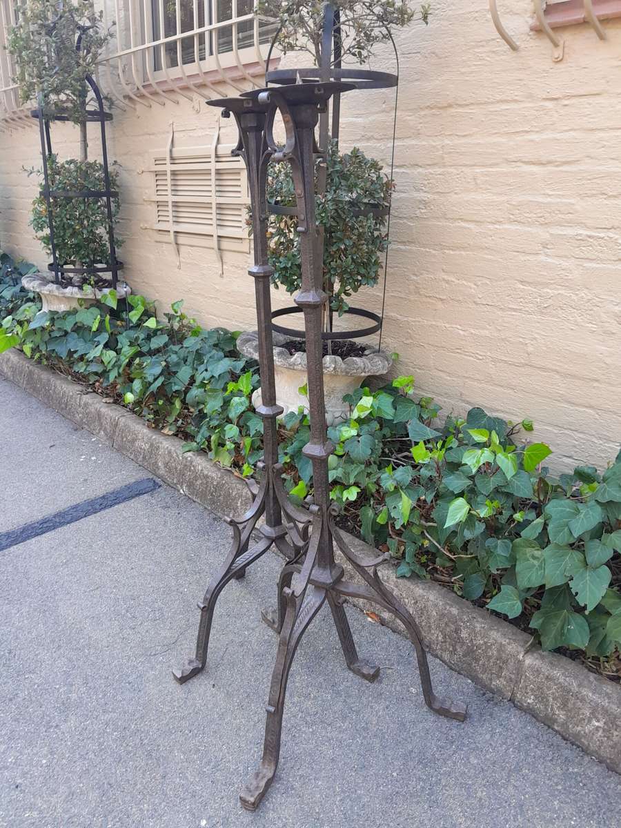 A Pair of Antique Cathedral Heavy Wrought Iron Candle Holders