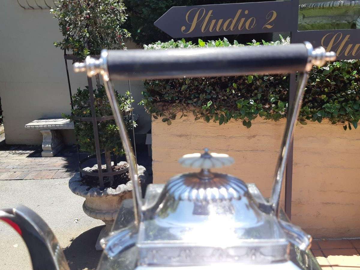 A Silverplate Kettle On Stand