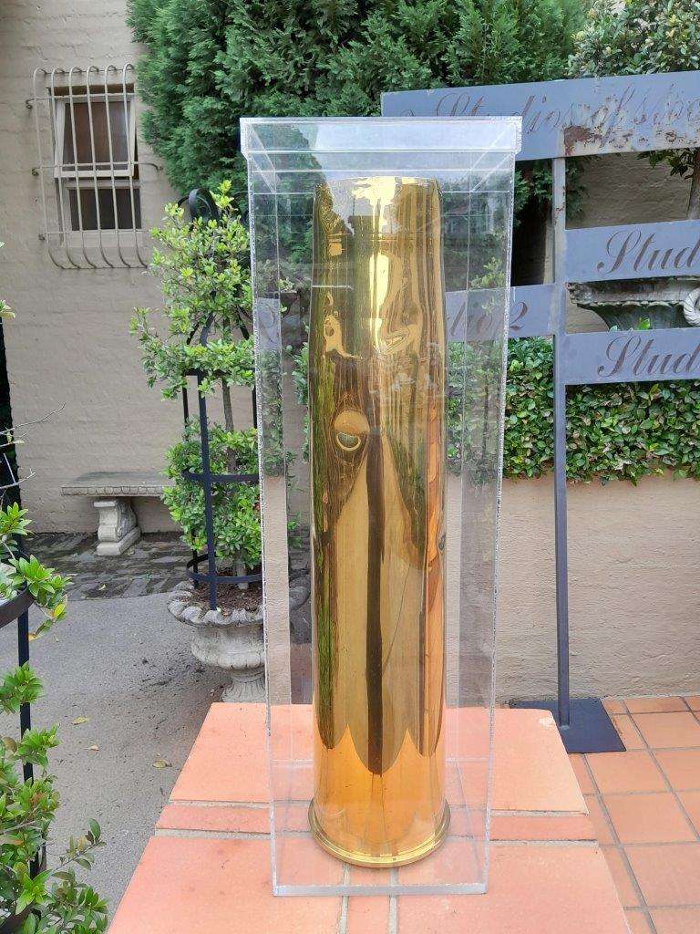 A 20TH Century Brass Cannon Shell In A Custom-Made Display Perspex Box