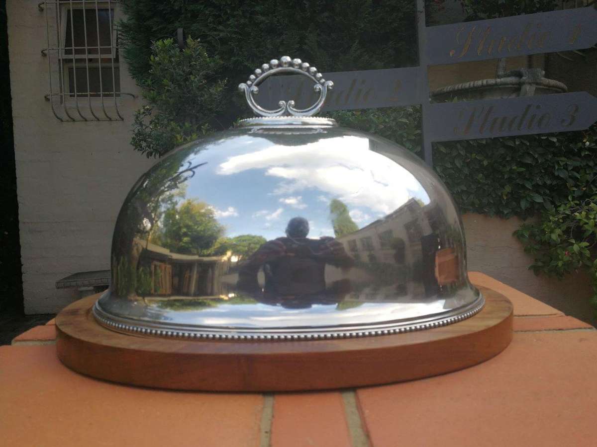 An Epns Food Dome On Wooden Base