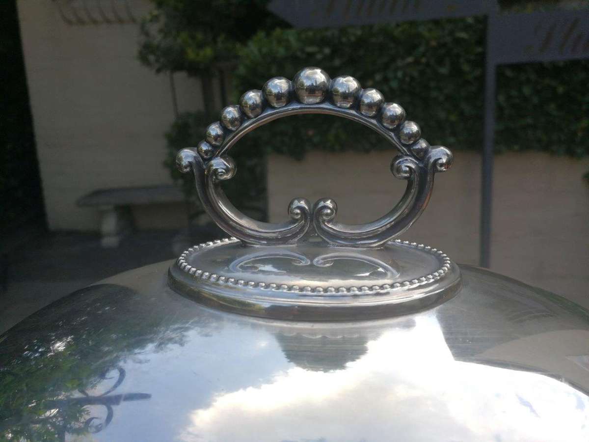 An Epns Food Dome On Wooden Base