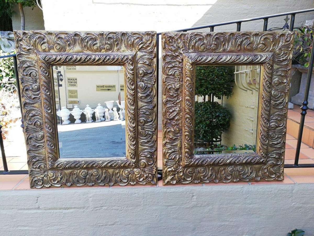 A Pair Of  20th Century Bevelled And Gilt-Painted Wooden Mirrors