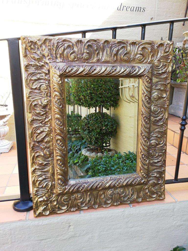 A Pair Of  20th Century Bevelled And Gilt-Painted Wooden Mirrors