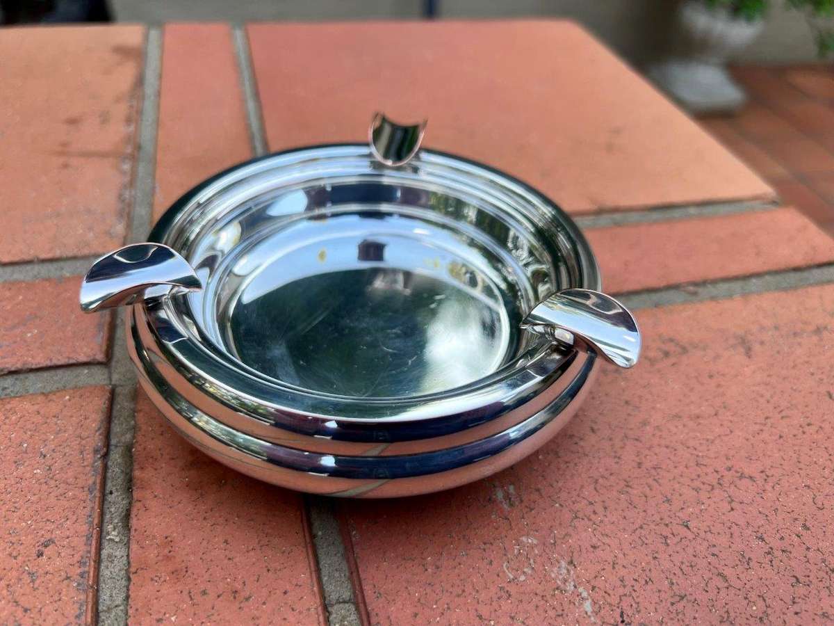 A Christofle Silver Plated Bottle Coaster, And A Silver Plated Ashtray