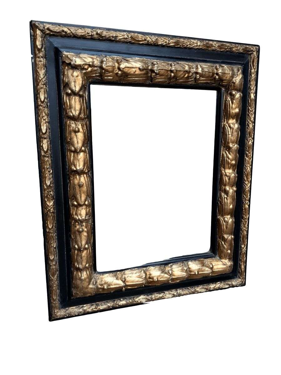 A 20th Century Gilt Painted And Ebonised Mirror