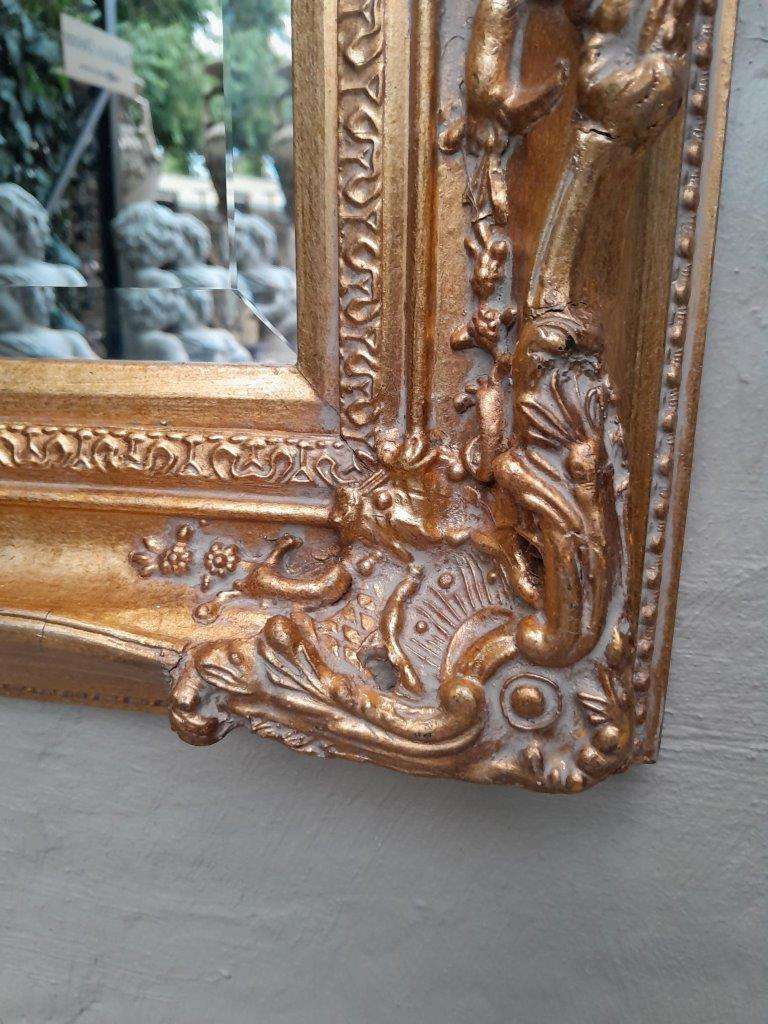 A 20th Century Victorian Style Gilt Painted Mirror