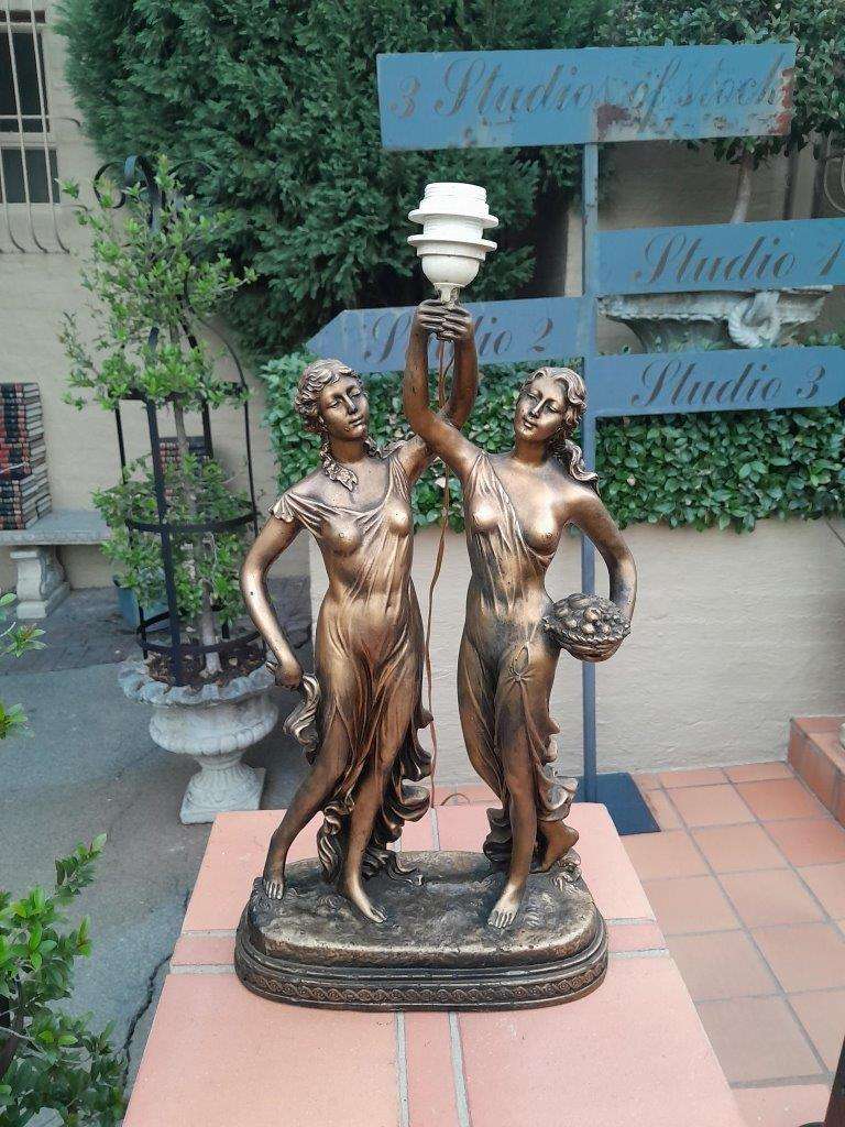 A 20th Century Gold Figural Lamp