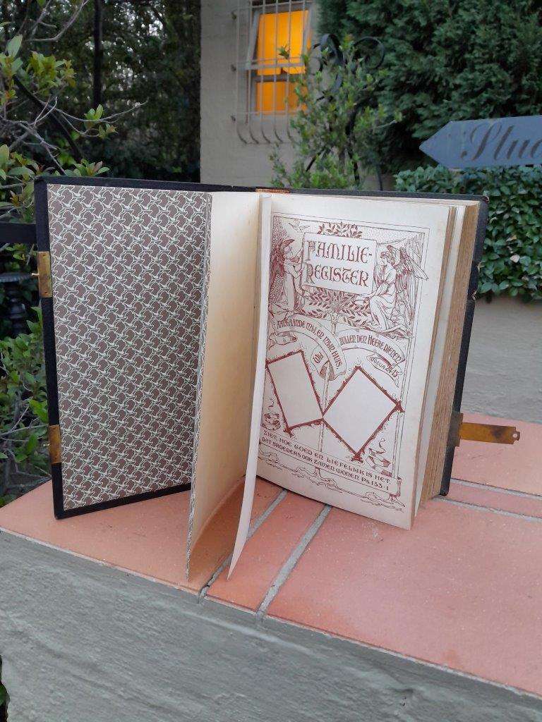 A Leather Bound Bible With Brass Clasps And Mounts