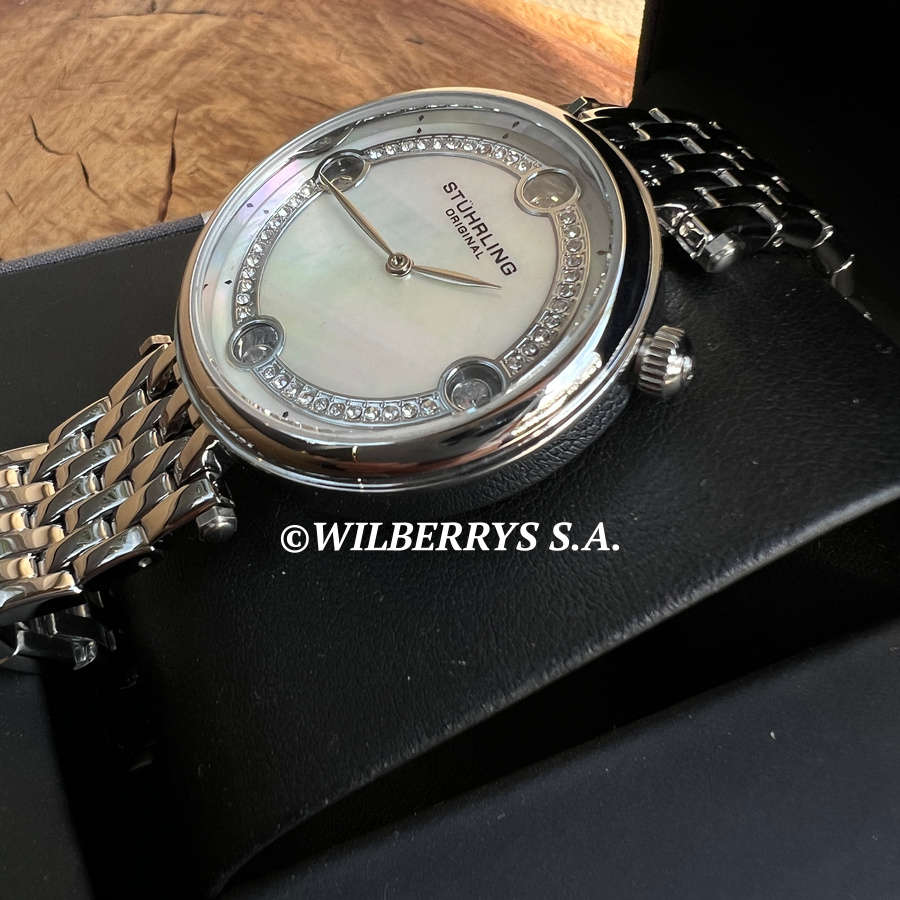 ****MUST SEE*** R7,999.00 STUHRLING ORIGINAL® Women`s Swiss Pearl Crystal Float Watch