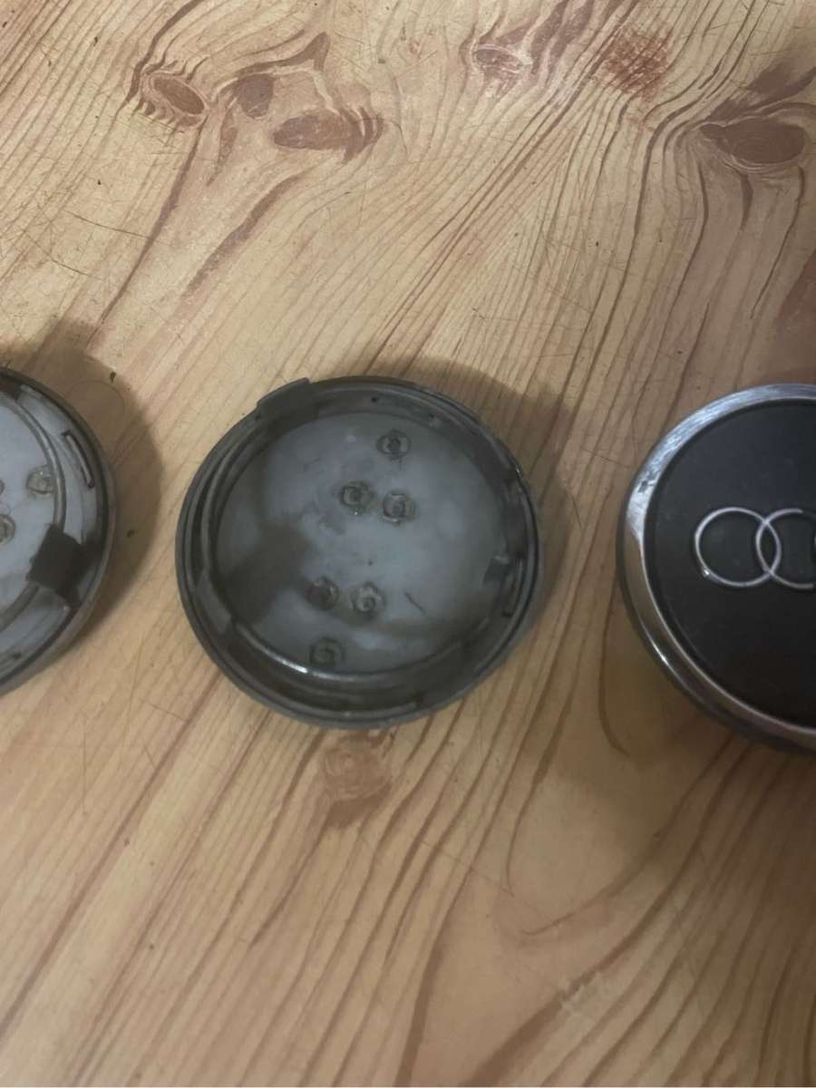 Audi 63mm Grey Mag Center Caps set of 4** Good Condition**
