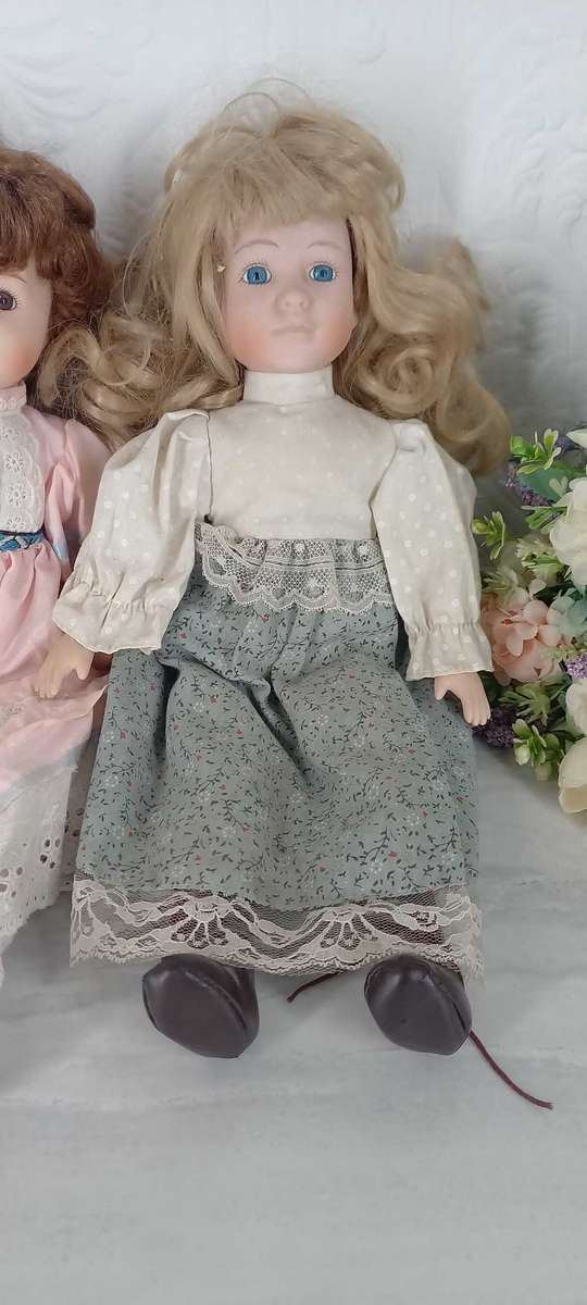 Trio of Porcelain Dolls