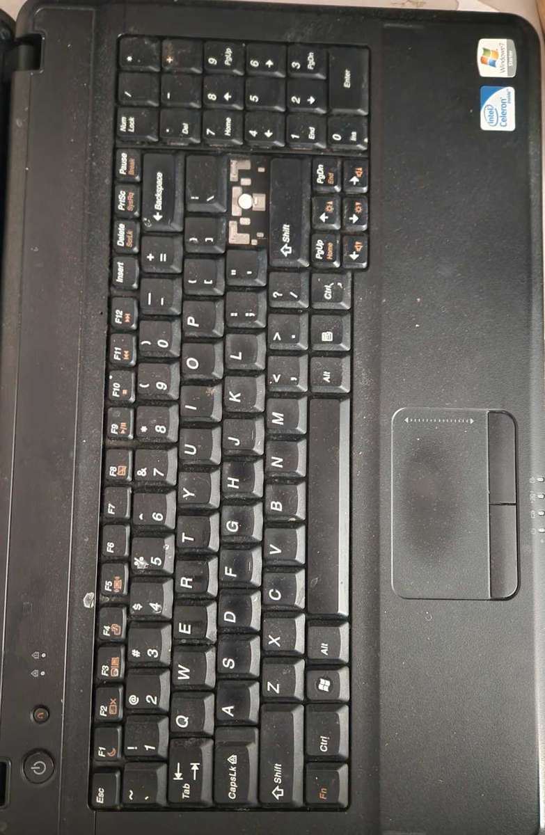 Two laptops for spares or to fix and a free cd writer also not working