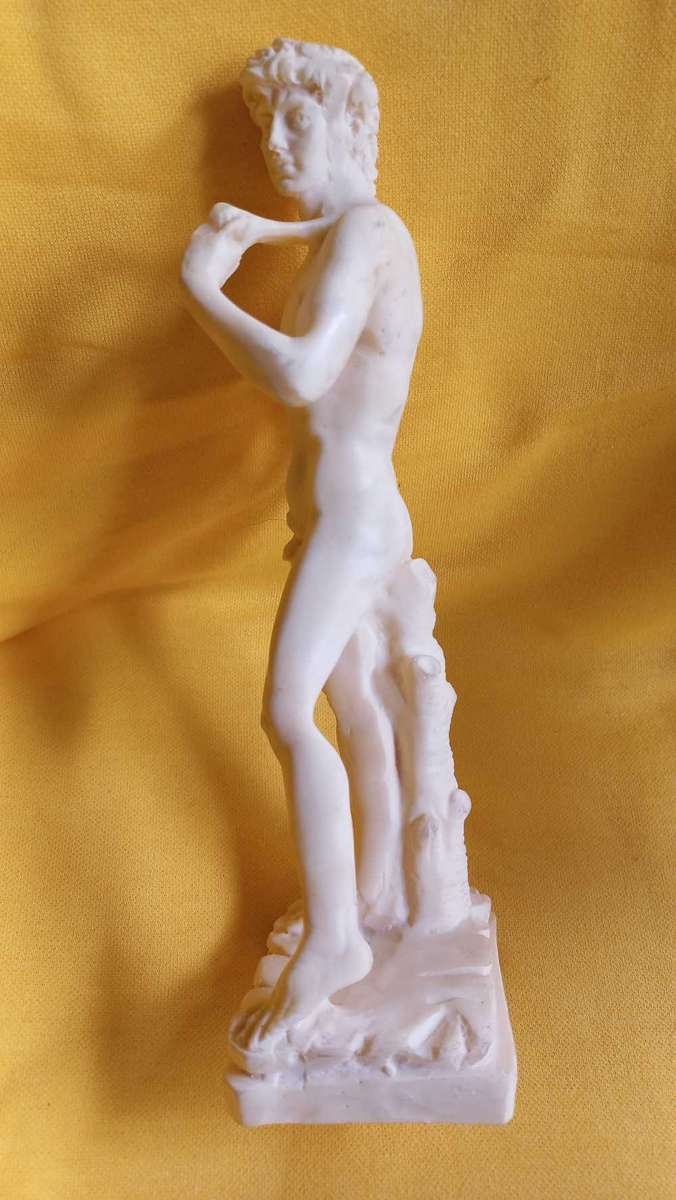 Vintage nude statues of Davide and Aphrodite Venus