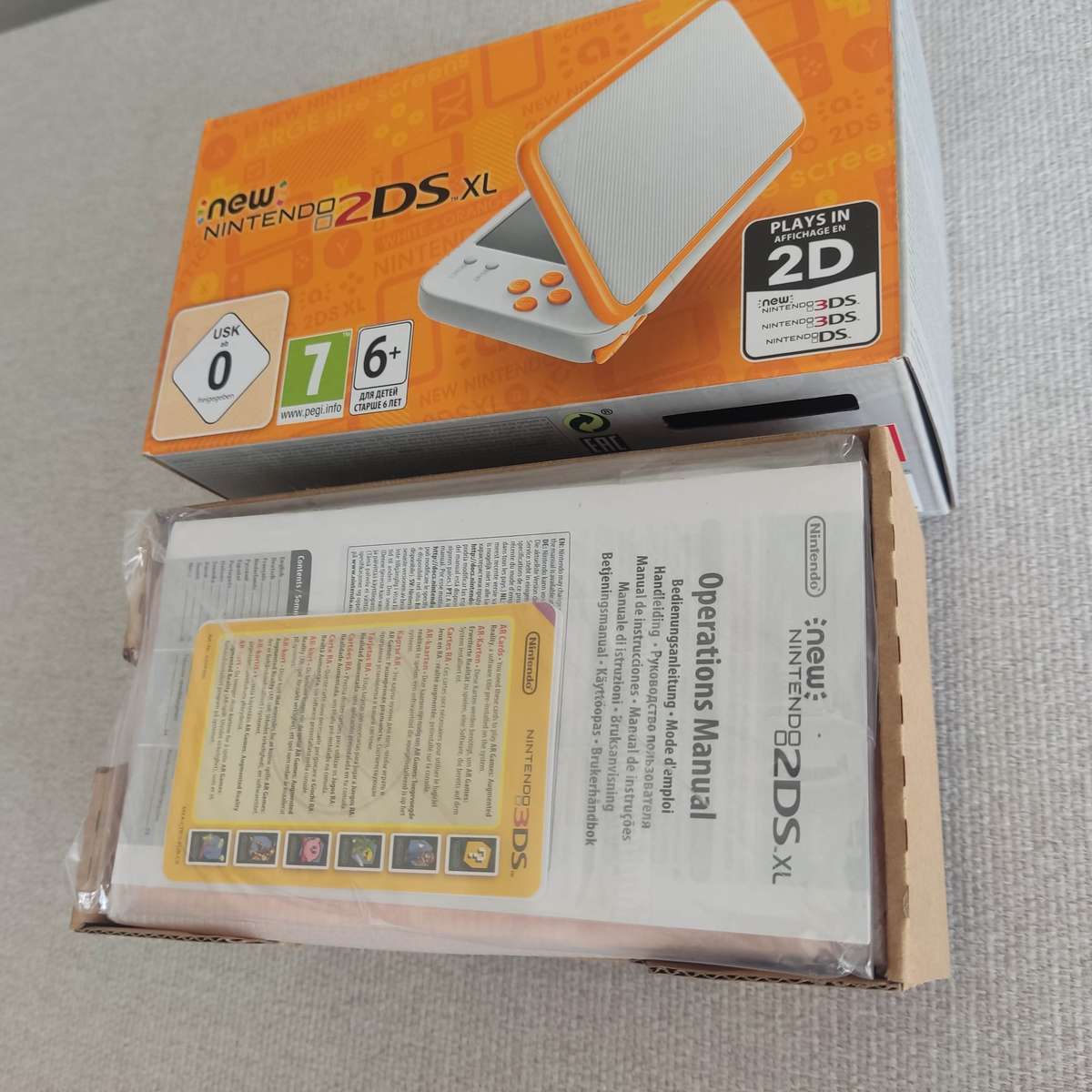 `New` Nintendo 2ds xl Console with original charger +box