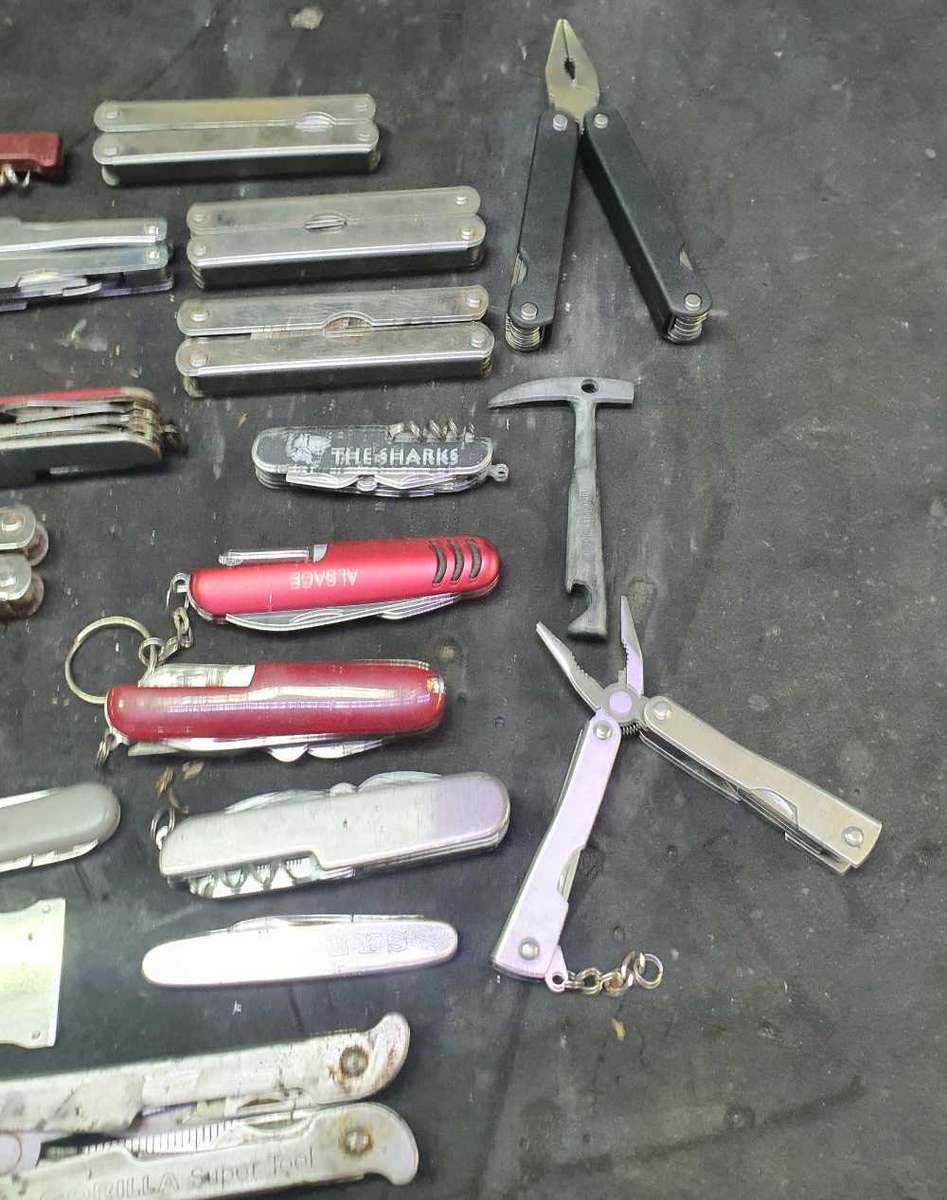 Assorted multitools,pockets knifes