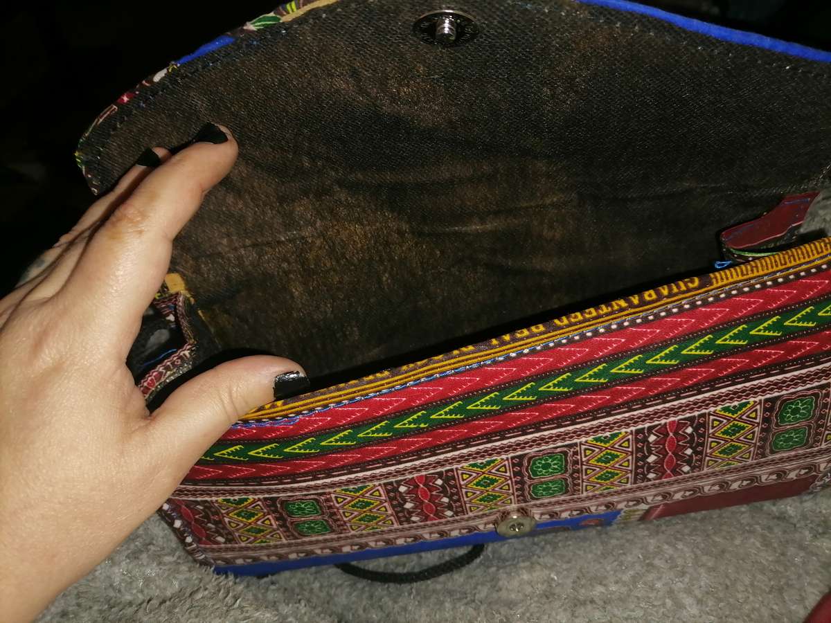 African clutch bag, neck piece, earrings and head scarf