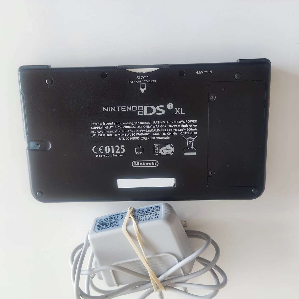 Nintendo Dsi XL console with charger