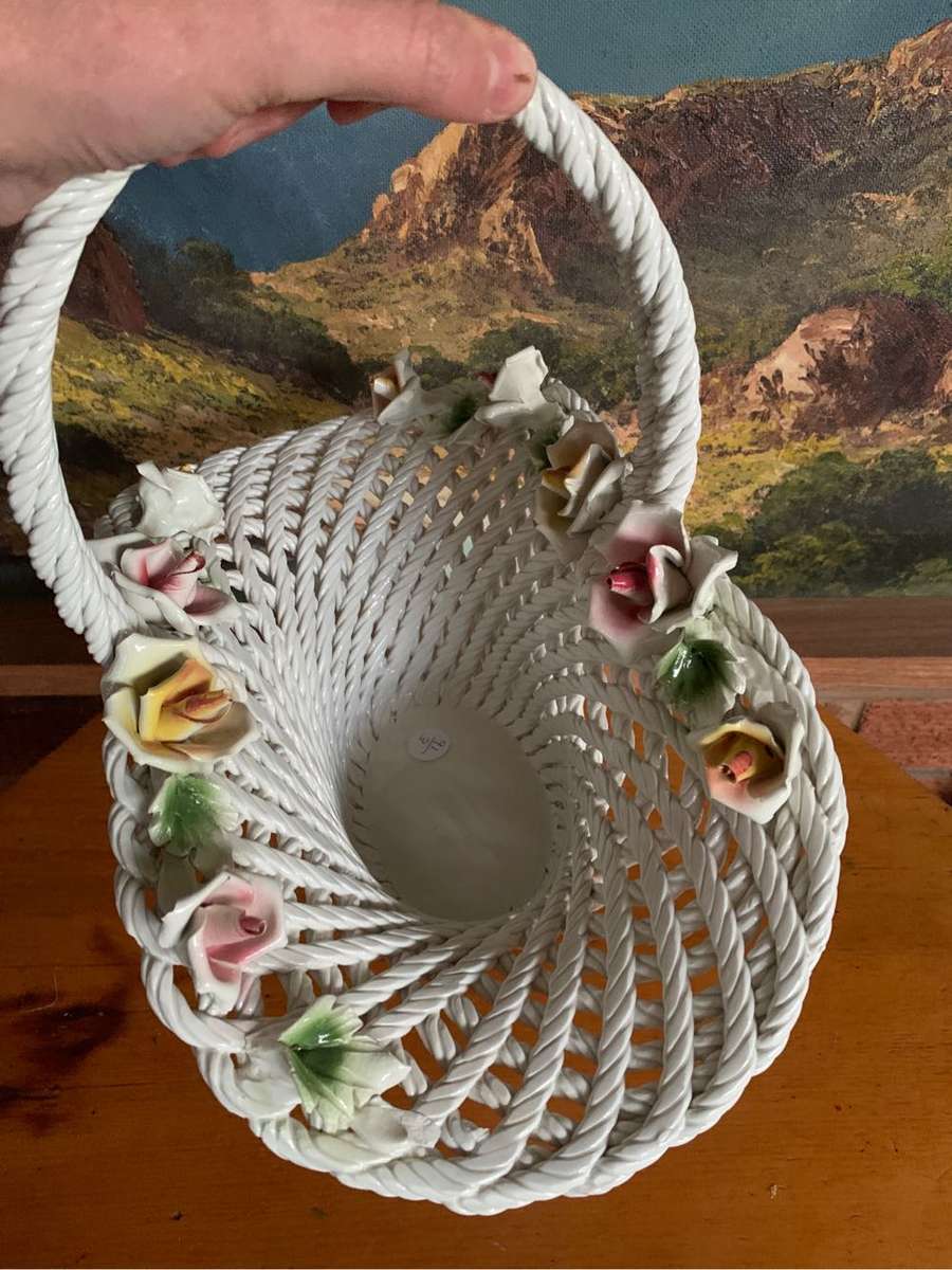 Huge woven pottery basket decorated with roses
