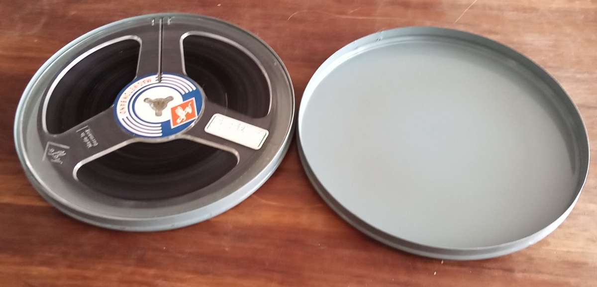 9.5mm Projector Film Reel in Vintage Tin.