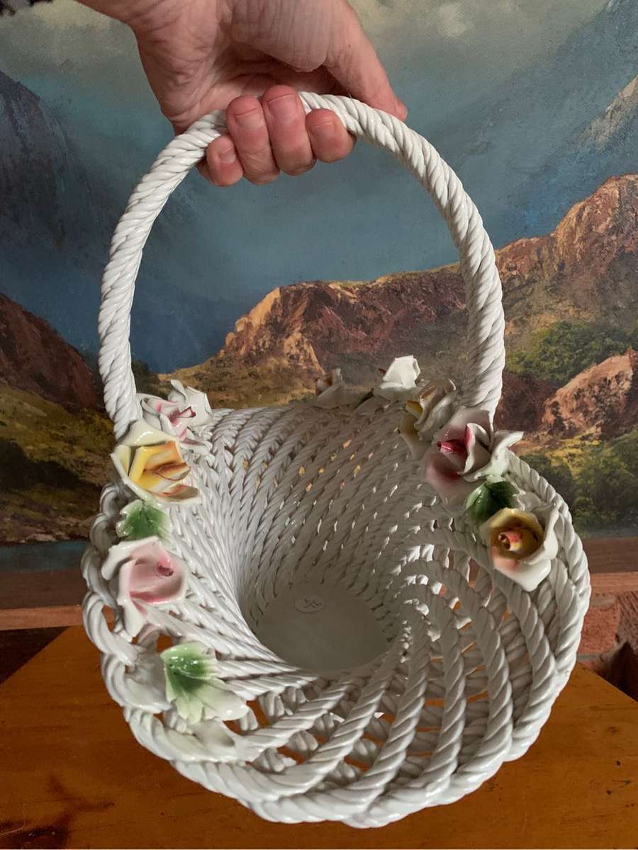 Huge woven pottery basket decorated with roses
