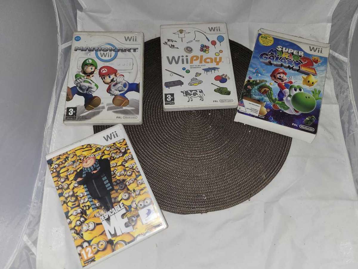 Nintendo wii with various accessories and games
