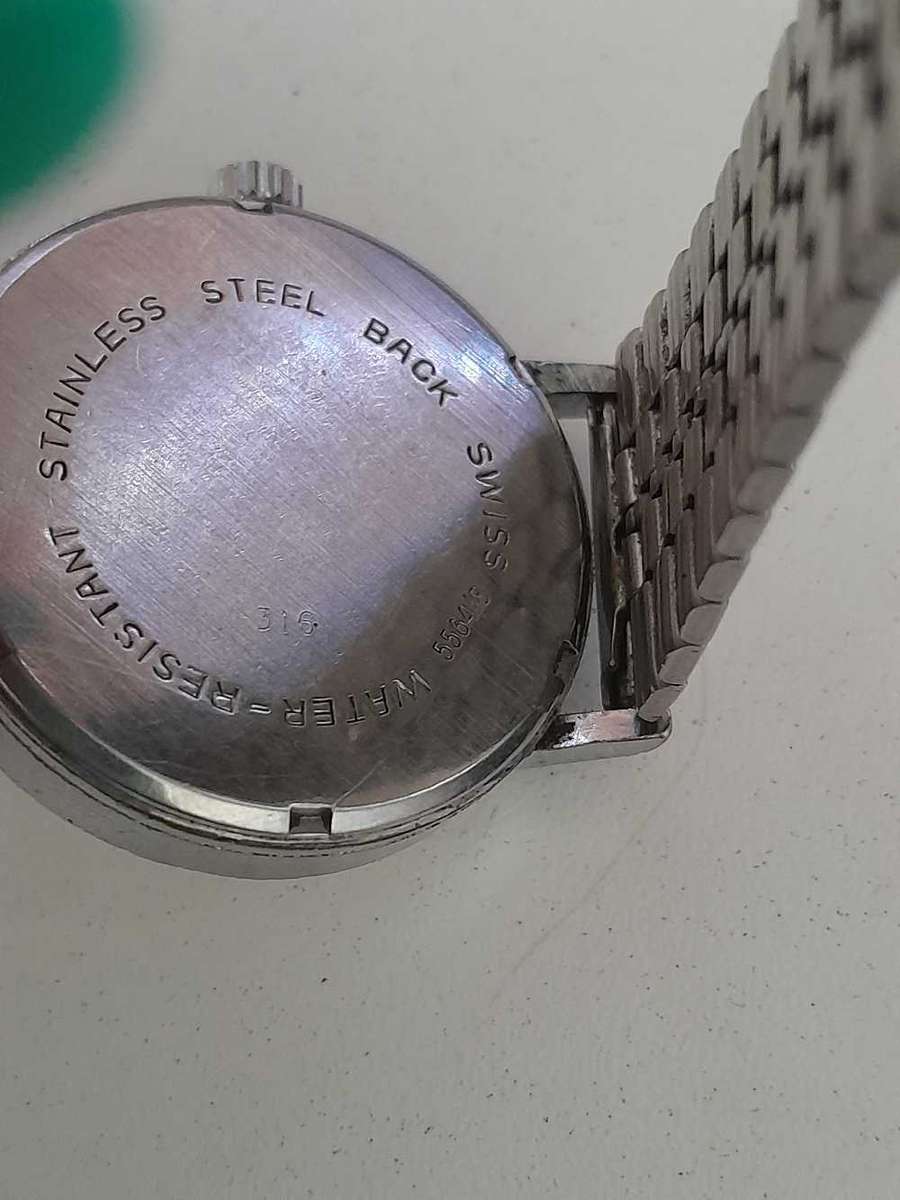 Rotary wind up watch