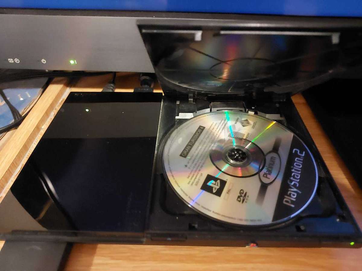 Playstation 2 + x6 Games