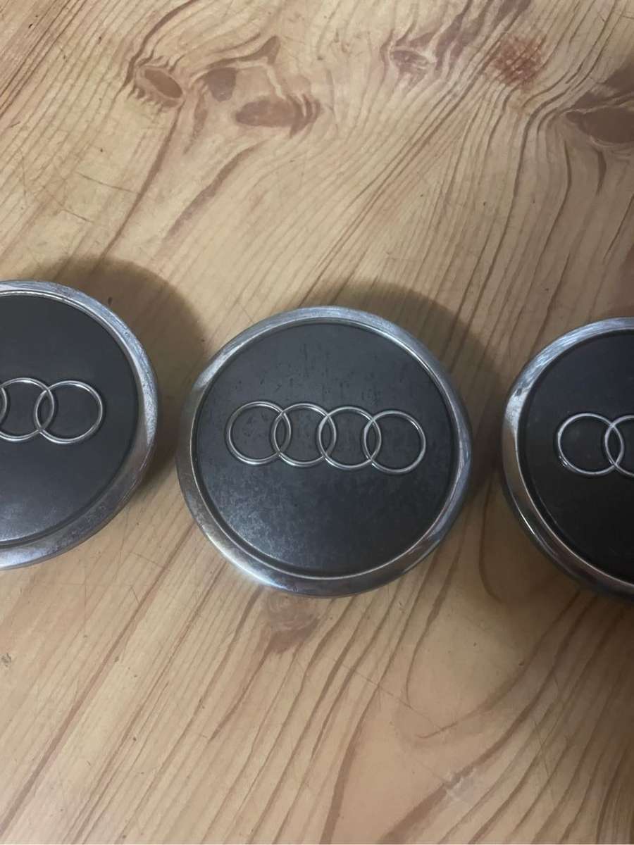 Audi 63mm Grey Mag Center Caps set of 4** Good Condition**