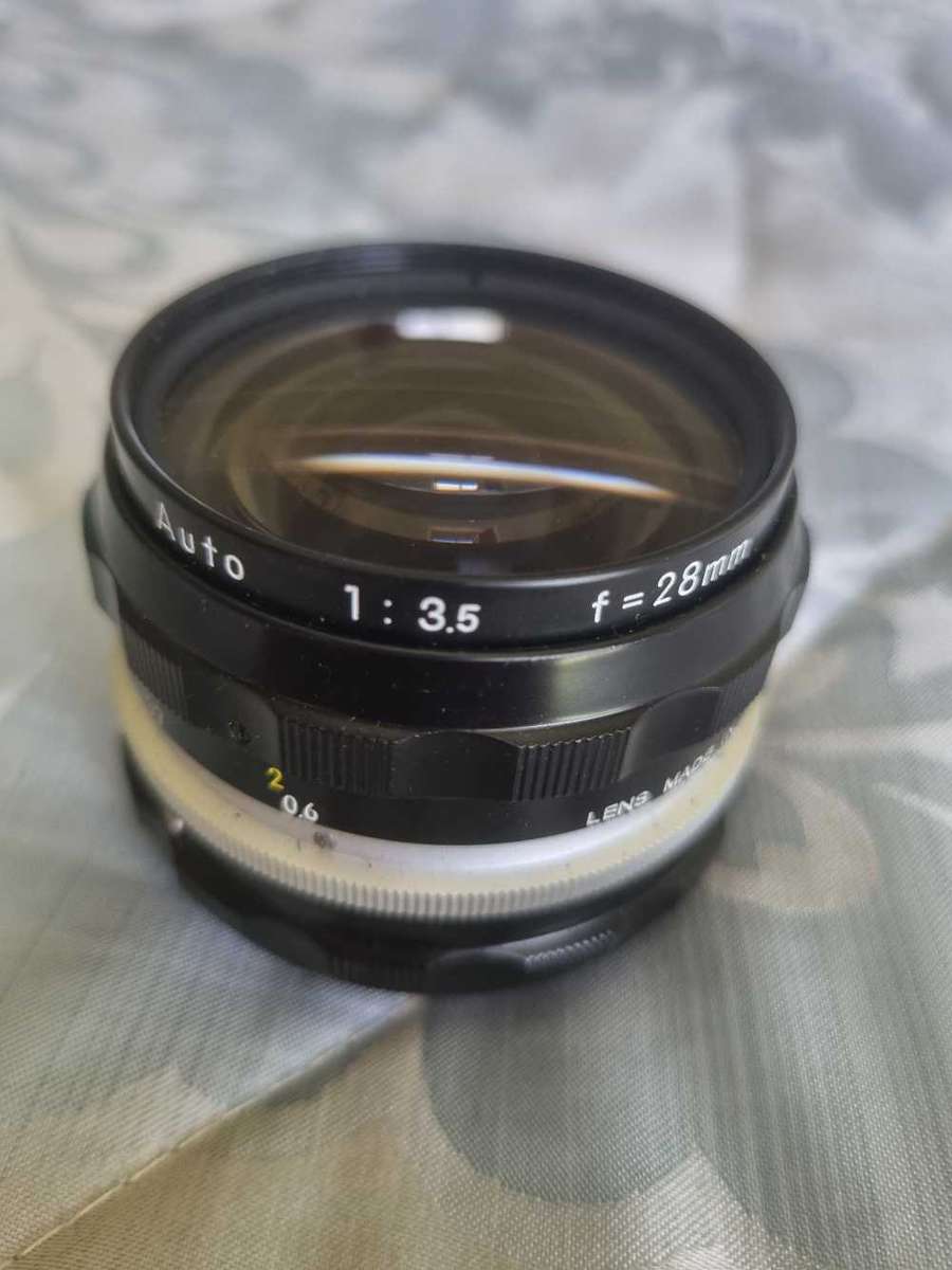 Vintage Tamron and Nikkor film camera lenses