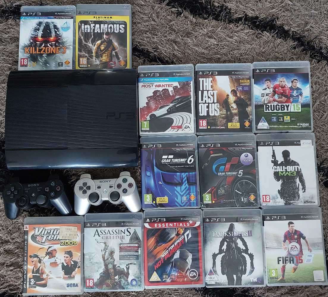 Playstation 3 + Games + 2 Original Controls