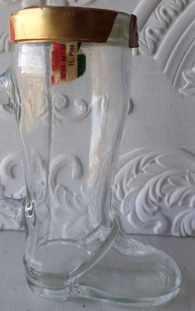 Glass bottle/holder shaped as a shoe/boot