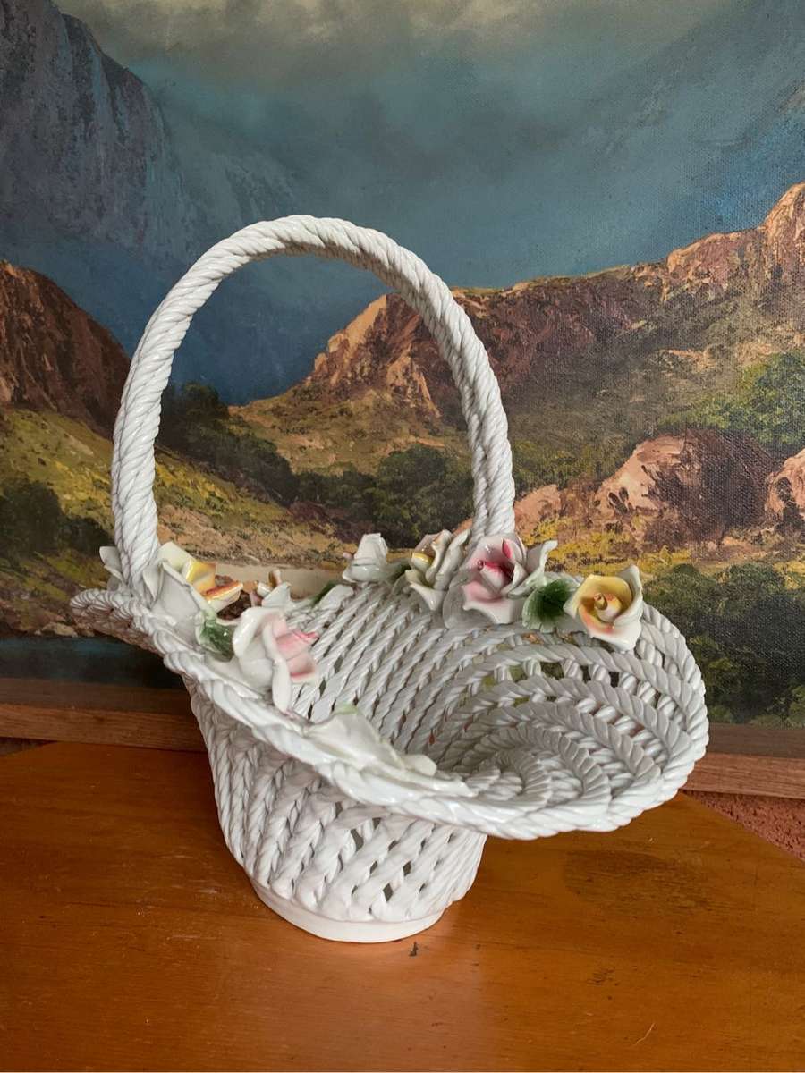 Huge woven pottery basket decorated with roses