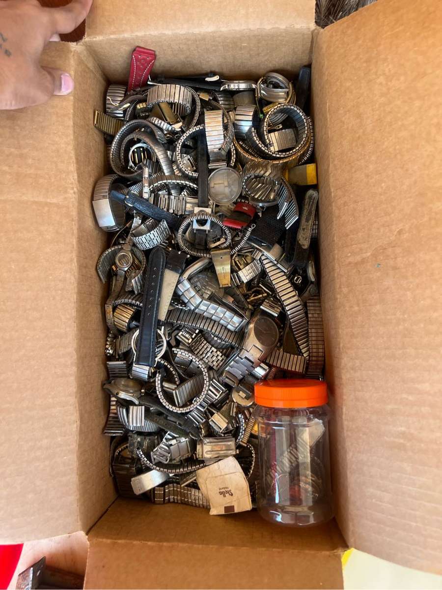 Box of watch parts