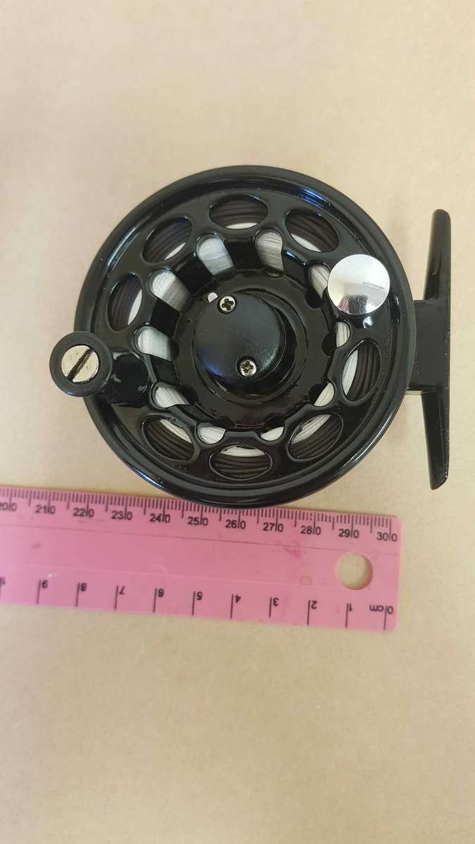 Explorer fly reel loaded with backing, fly line and tippett.