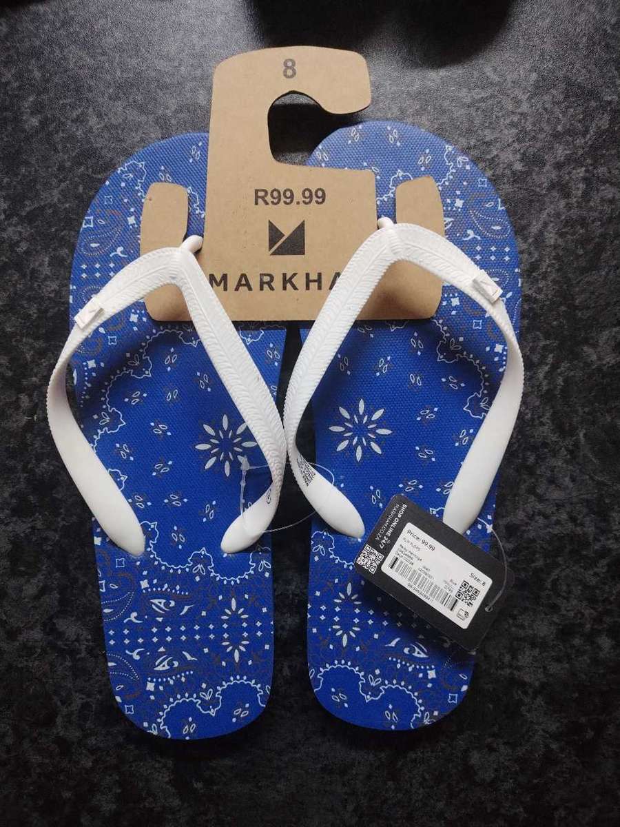 Various clothing and tech items