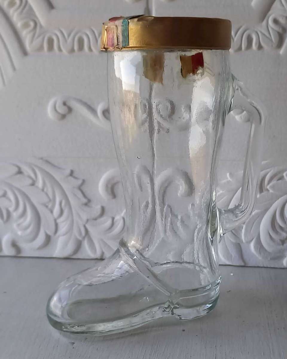 Glass bottle/holder shaped as a shoe/boot
