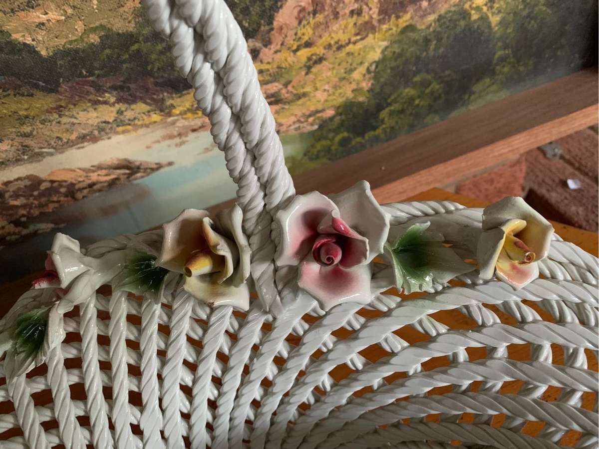 Huge woven pottery basket decorated with roses