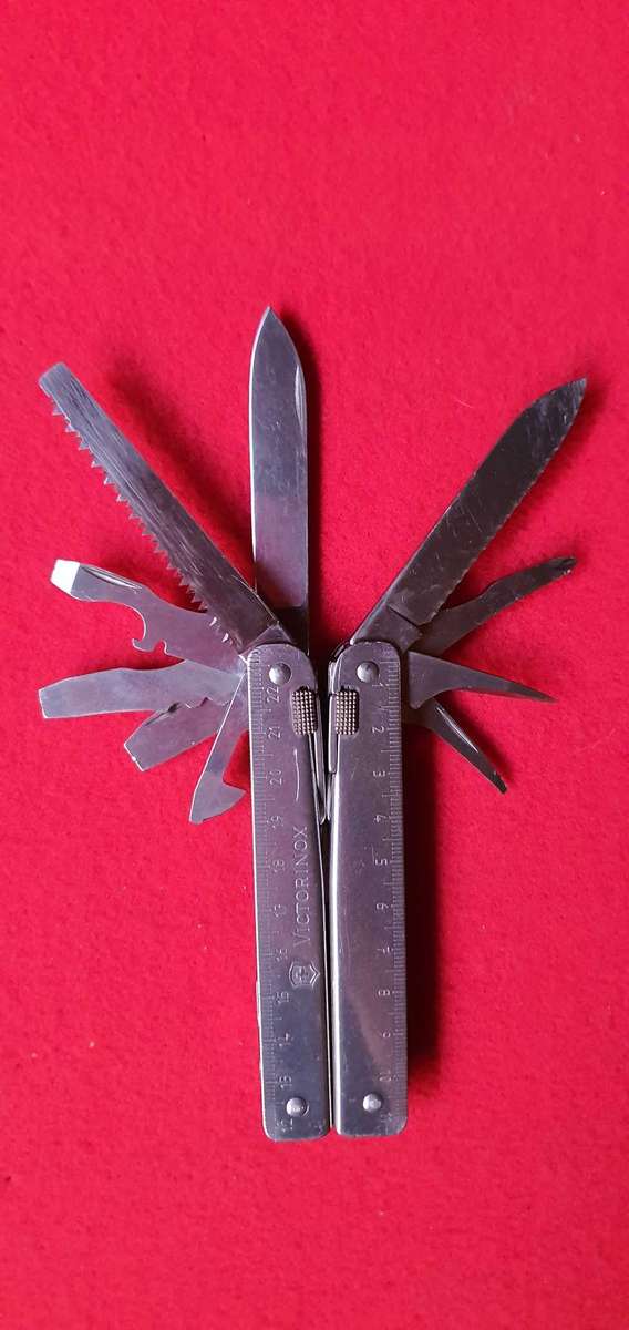 Victorinox SwissTool Multi-Tool  Stainless Steel  Branded  With Original Pouch