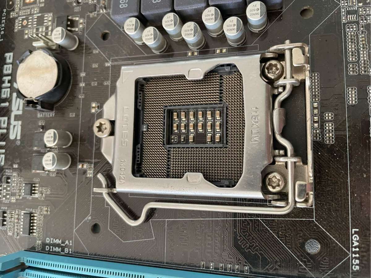 Asus P8H61 Plus Motherboard**For Parts Or repairs**