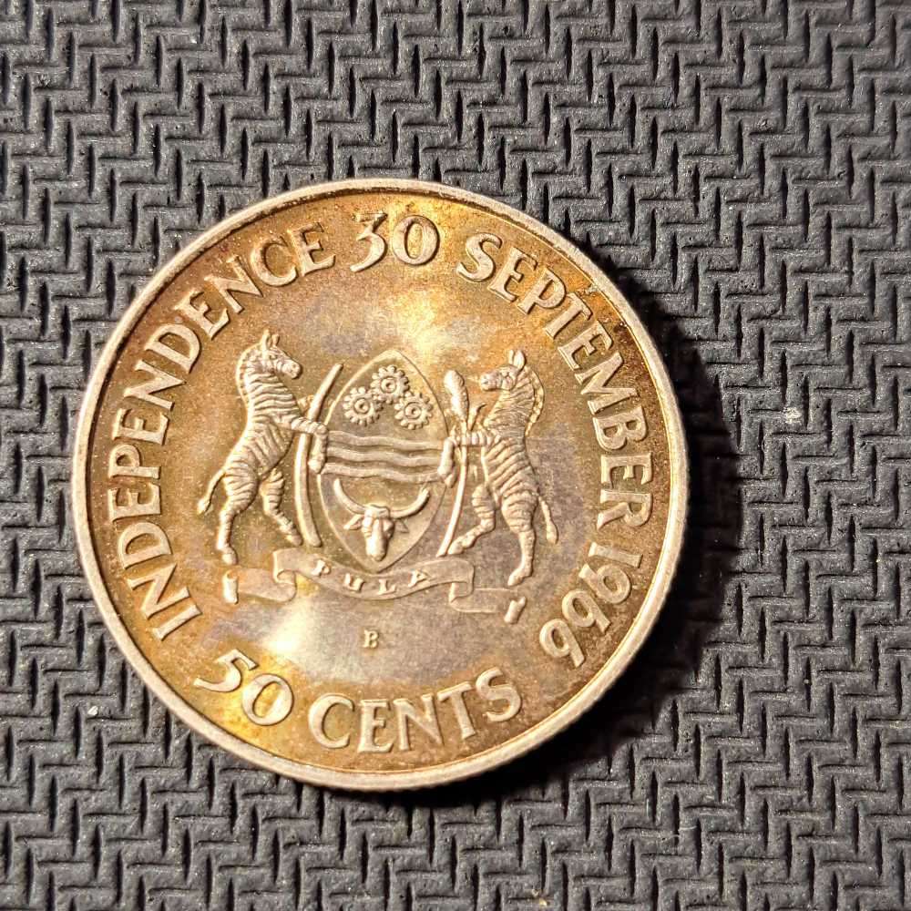 4 x silver coins. Botswana 50 cents, Independence 1966