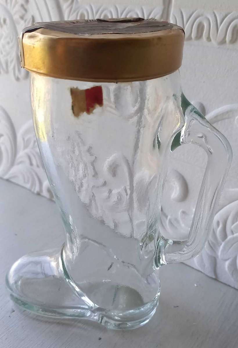 Glass bottle/holder shaped as a shoe/boot