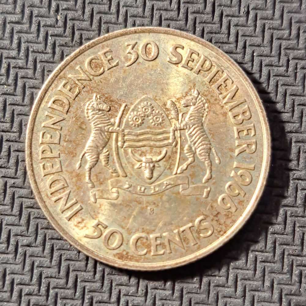 4 x silver coins. Botswana 50 cents, Independence 1966
