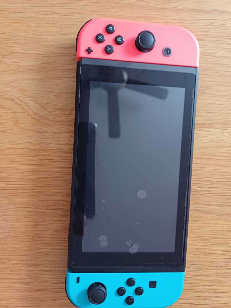 Nintendo Switch with accessories and games