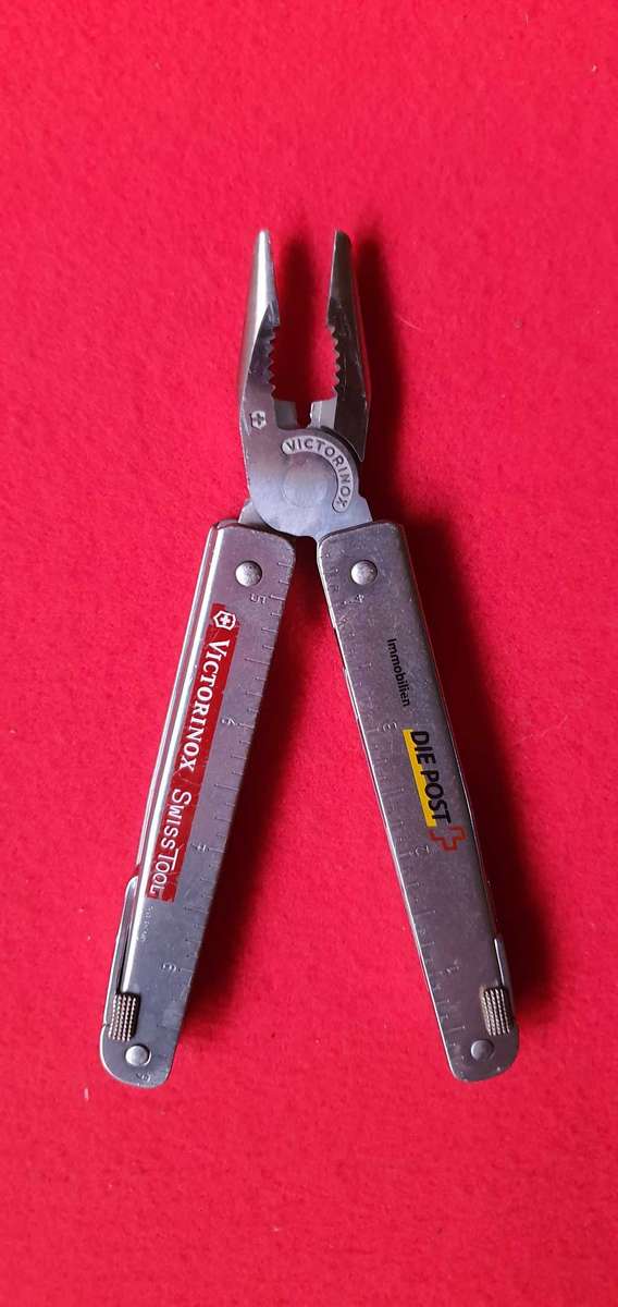 Victorinox SwissTool Multi-Tool  Stainless Steel  Branded  With Original Pouch